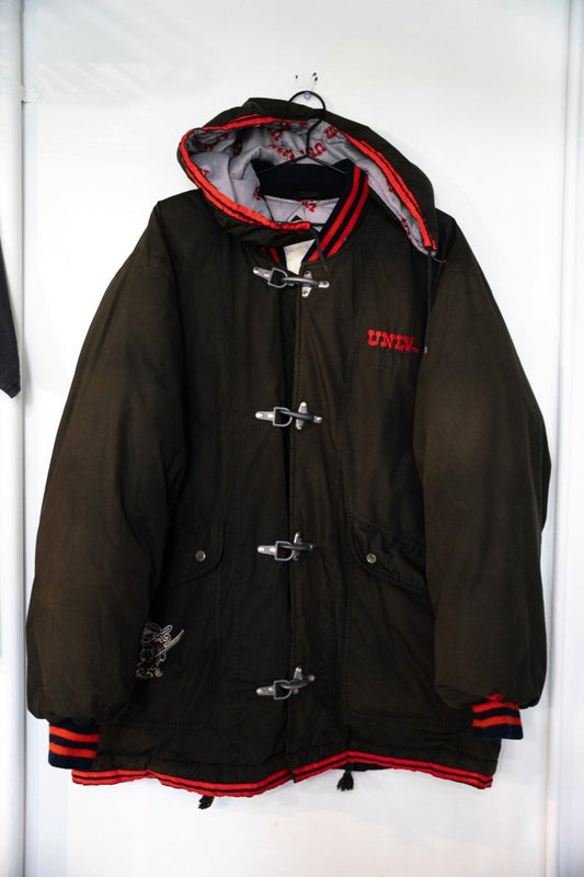 Starter 1991 UNLV Runnin' Rebels "Fireman" Parka in XL with red and black colorway, displayed flat showing front torso area, zipper missing