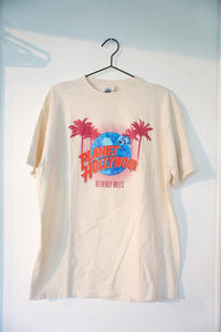 Cream off-white vintage 1995 Planet Hollywood Beverly Hills grand opening tee with blue globe logo pink palm trees red text size XL
