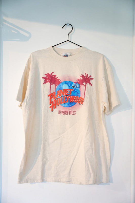 Cream off-white vintage 1995 Planet Hollywood Beverly Hills grand opening tee with blue globe logo pink palm trees red text size XL