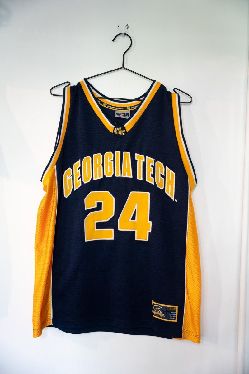 Colosseum Athletics Georgia Tech basketball jersey in navy blue with gold trim, size large, displayed flat against white background
