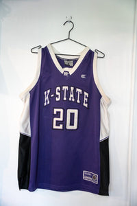 Colosseum Athletics Kansas State College basketball jersey in large size, maroon colored with white lettering and sleeve stripes