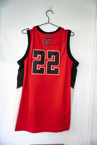 Colosseum Athletics Texas Tech Red Raiders basketball jersey in red, size large, displayed flat showing front panel with team graphics and lettering