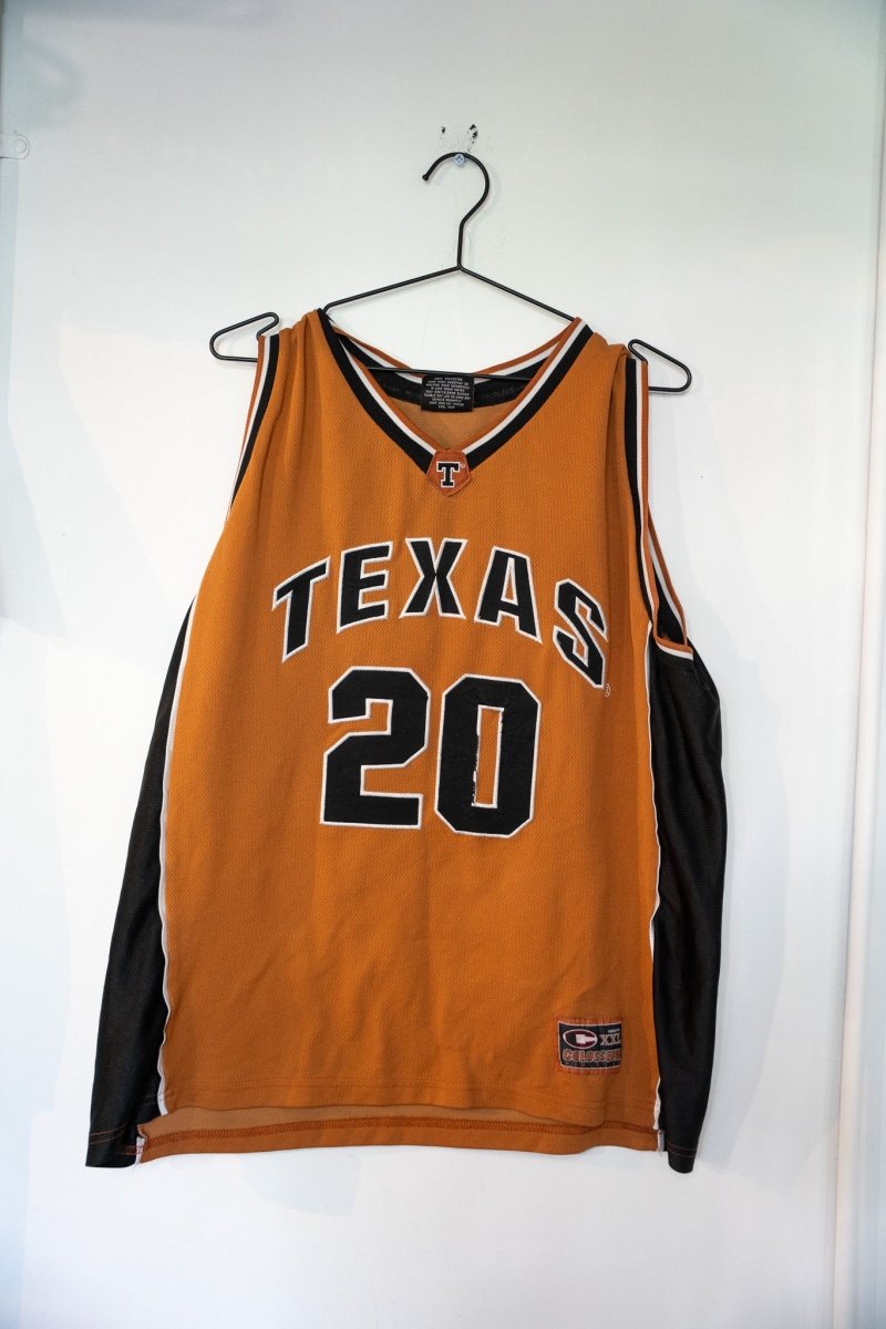 Colosseum Athletics University of Texas college basketball jersey in burnt orange, size XL, displayed flat against white background