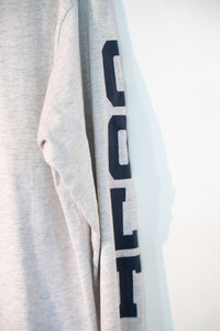Colt Real Cowboys Shoot Colts long sleeve shirt in XXL, featuring graphic text print on cream colored cotton fabric