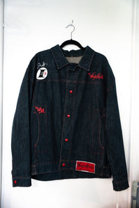 Dark indigo vintage Wayne Morris denim trucker jacket with red snap buttons red stitching WM monogram I3 patch red Wayne Morris label size XL
