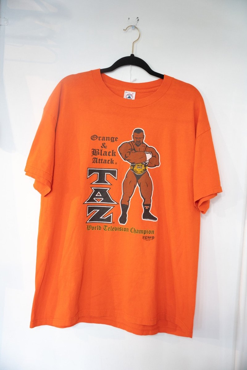 Orange vintage ECW Taz Orange and Black Attack World Television Champion t-shirt with cartoon Taz illustration and TAZ block lettering size XL