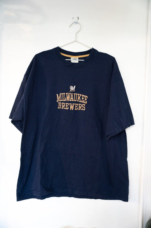 Navy blue vintage Lee Sport Milwaukee Brewers shirt with embroidered M logo and gold MILWAUKEE BREWERS block lettering