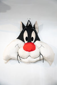 Vintage Looney Tunes Sylvester the Cat oversized face pillow with black and white fabric, red nose, and cord whiskers