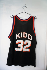 Champion Phoenix Suns NBA basketball jersey size 44 in purple with player number and name across back, 1990s era