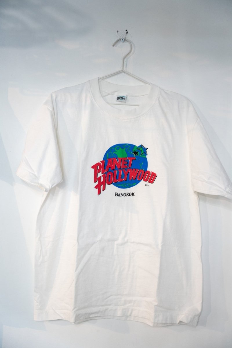 Planet Hollywood Bangkok graphic t-shirt in large size, featuring the restaurant chain's logo in color print on front, circa 1990s-2000s