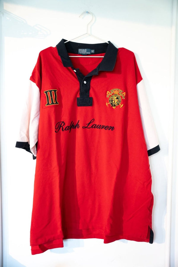 Red vintage Polo Ralph Lauren polo shirt with white sleeves black trim III patch embroidered crest Ralph Lauren script size 4XL