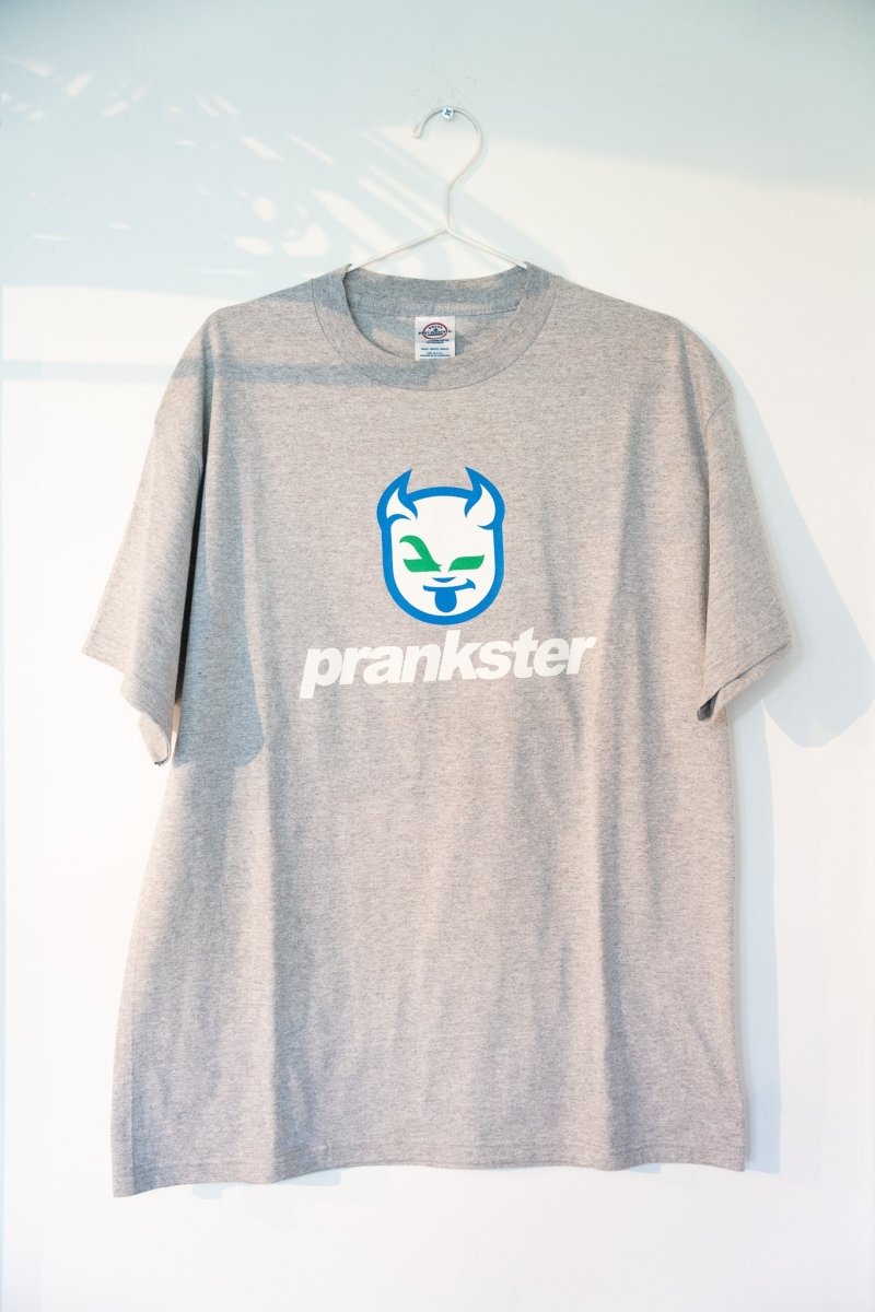Heather gray vintage Prankster tee with blue circular devil face mascot logo white prankster lowercase text size Large