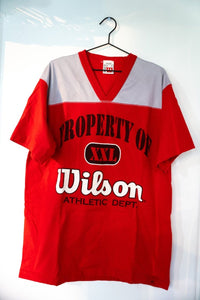 Red vintage Property of Wilson athletic jersey shirt with gray mesh shoulders XXL badge white Wilson cursive Athletic Dept V-neck size XL