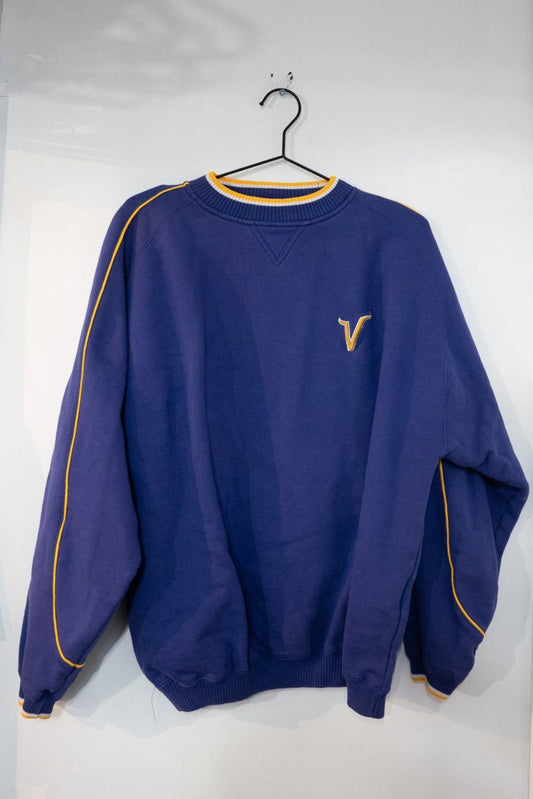 Purple vintage Puma Minnesota Vikings crewneck sweater with gold piping on shoulders and sleeves and embroidered V horn logo