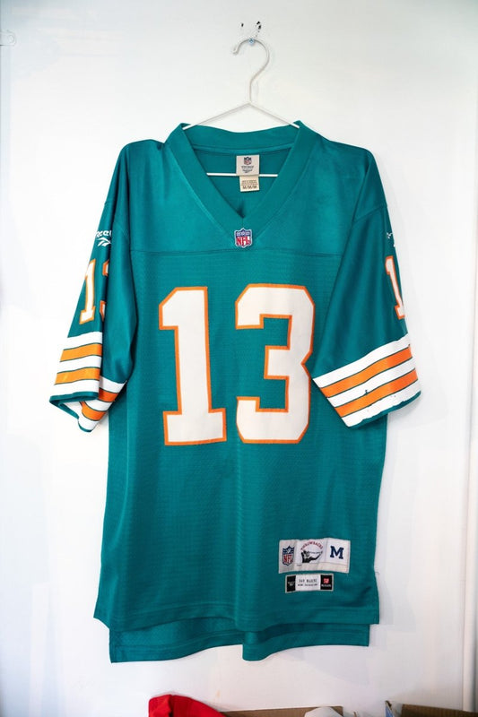 Reebok Miami Dolphins #13 football jersey in teal and orange, size medium, 1980s-90s style with crew neck and short sleeves
