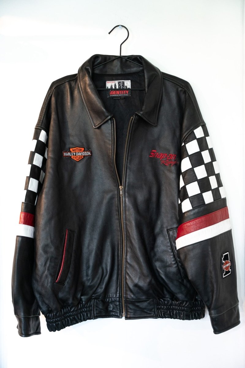 Black vintage Snap-On Racing leather jacket with checkered flag sleeves red white stripes Harley-Davidson patch spread collar zip front size XXL