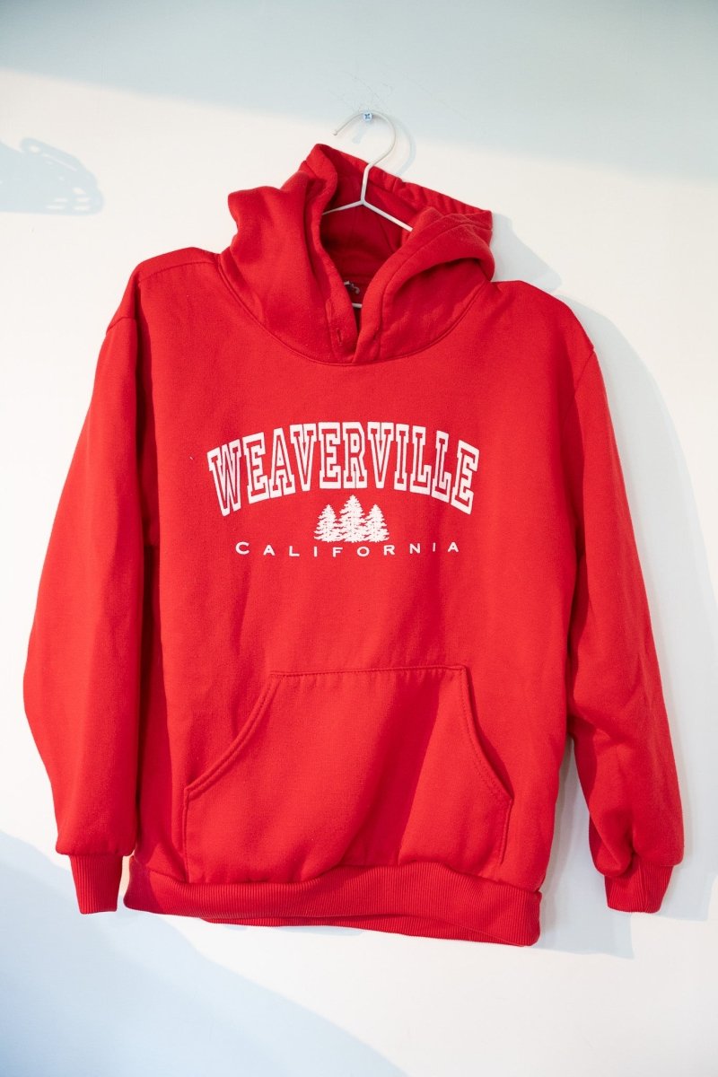 Red vintage Weaverville California pullover hoodie with white WEAVERVILLE text pine trees CALIFORNIA graphic drawstring hood size Medium