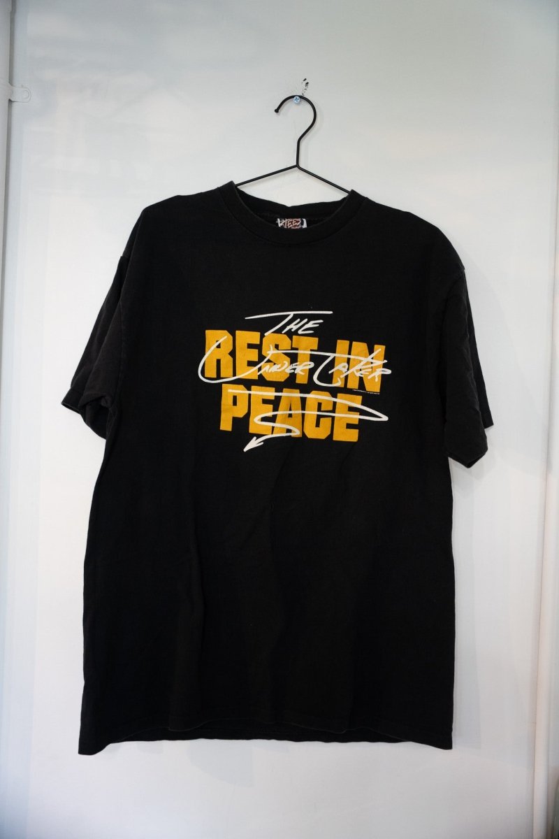 Black vintage WWF The Undertaker Rest In Peace t-shirt with gold REST IN PEACE block lettering and white Undertaker script overlay size XL