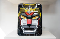 Voltron Collection Black Lion DVD set collector's tin embossed robotic lion face gold red black glowing eyes VOLTRON yellow text lightning