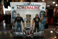WWE Adrenaline Series 32 action figures showing The Miz and John Morrison in wrestling attire with articulated joints