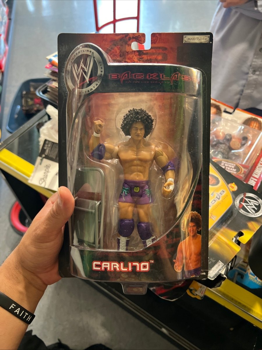 WWE Backlash Pay Per View Series 13 Carlito action figure with black and red outfit, displayed in retail packaging