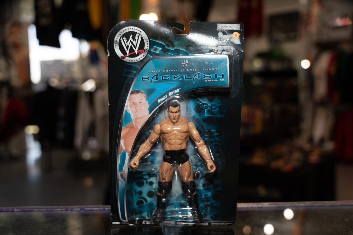 WWE Backlash Series 12 Randy Orton action figure with articulated joints and detailed wrestling attire in original packaging