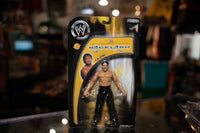 WWE Backlash Tajiri action figure with black hair, white face paint, and black wrestling attire with Asian-inspired designs