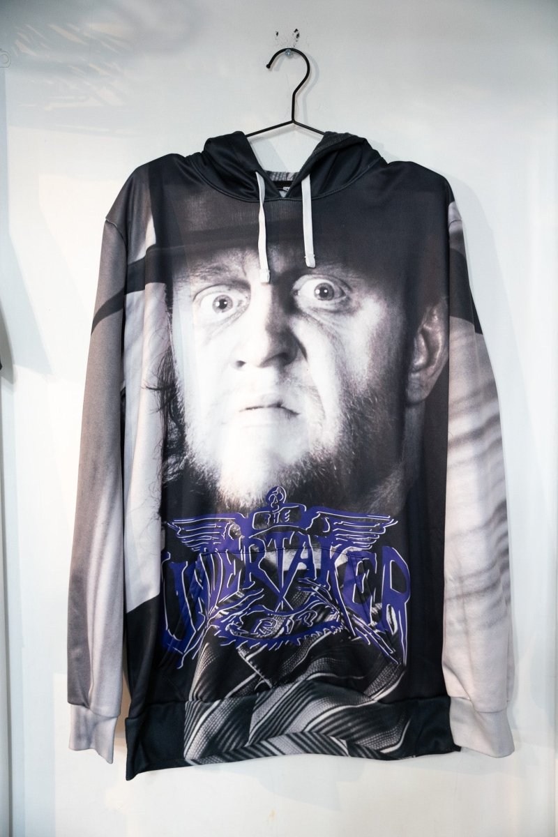 Chalk Line Undertaker 30th Anniversary WWE retro hoodie in large size, displayed flat showing front graphic print and drawstring hood