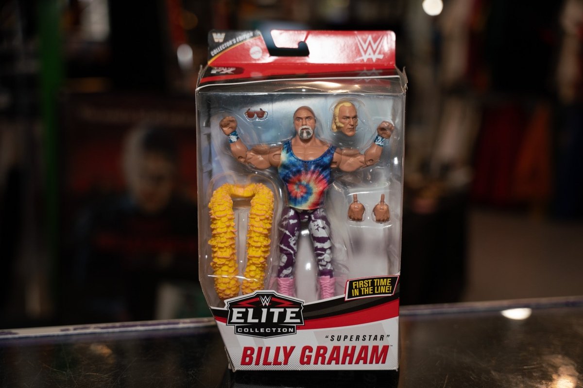 WWE Elite Collection Billy Graham action figure with painted yellow and black outfit, posed against plain background