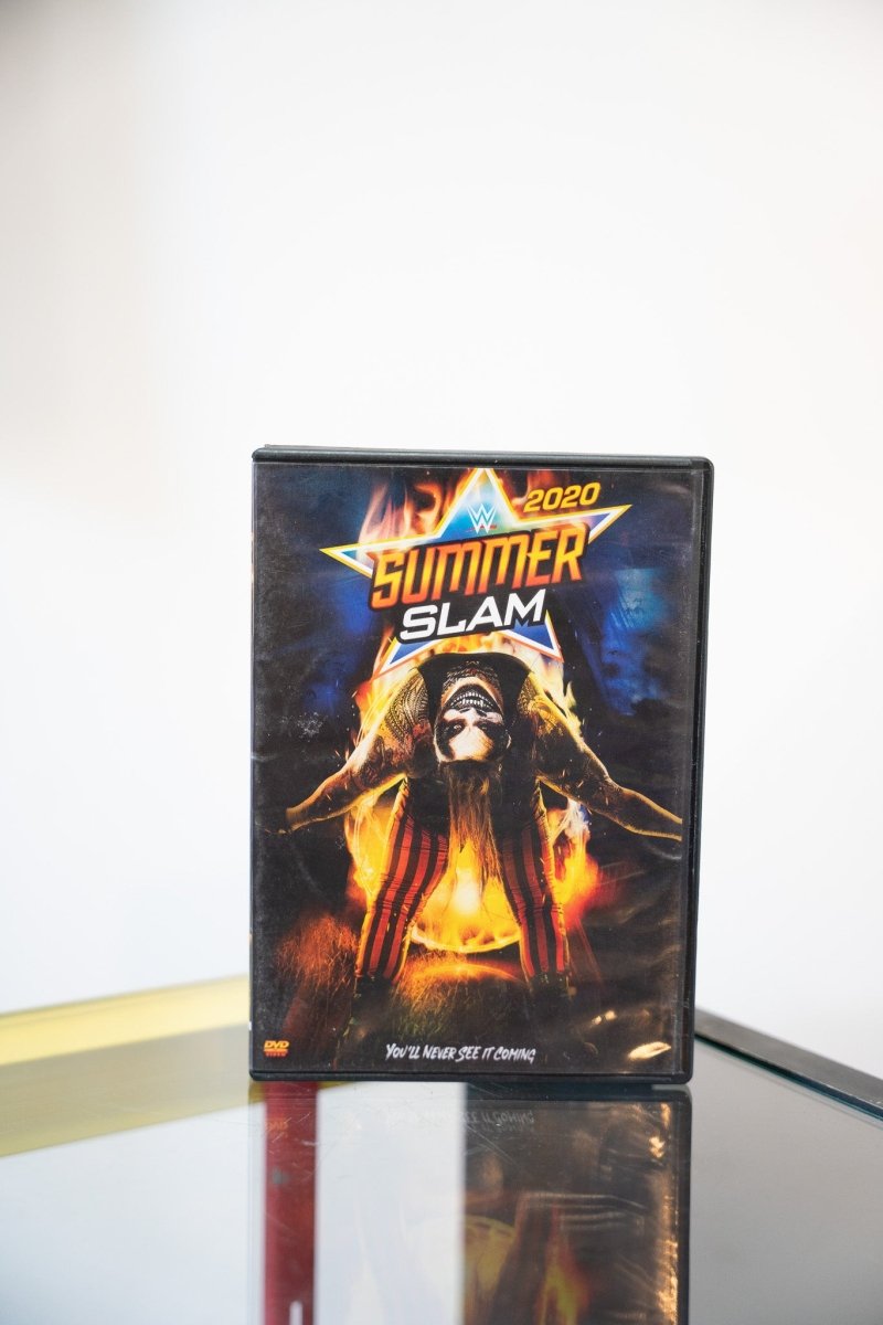 WWE SummerSlam 2020 DVD dark cover The Fiend Bray Wyatt mask red striped pants fire effects SummerSlam star logo You'll Never See It Coming
