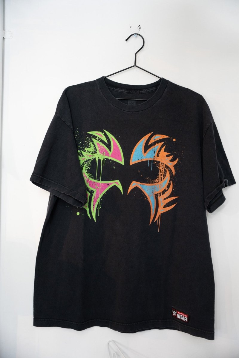 WWE The Usos "Play Hard in The Paint" authentic wear t-shirt in size XL with printed graphic design on black cotton fabric