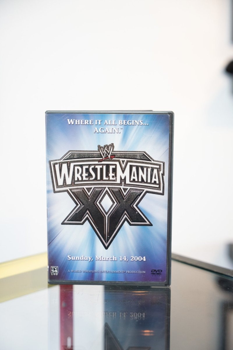 WWE WrestleMania XX DVD blue white cover metallic silver WrestleMania XX logo light burst Where It All Begins Again March 14 2004 TV-14