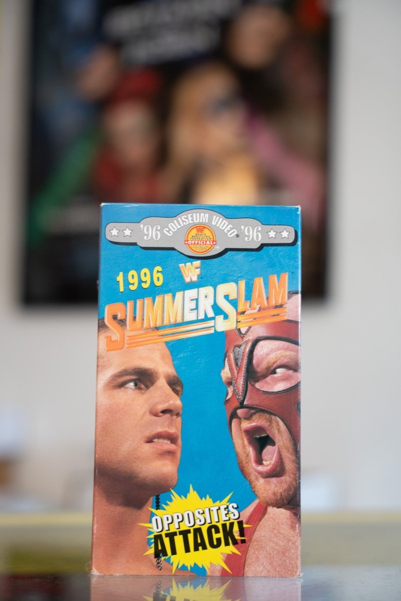 WWF 1996 SummerSlam VHS with Shawn Michaels and Vader face-to-face close-up on blue cover with orange SUMMERSLAM title