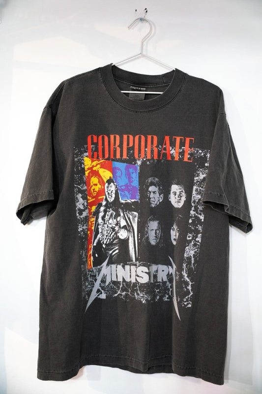 Faded charcoal WWF Corporate Ministry shirt with Undertaker and faction members in collage style and silver Ministry lettering