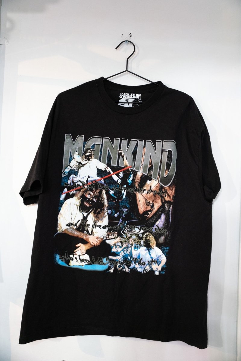 Black WWF Mankind modern boot shirt with chrome MANKIND lettering and collage of Mick Foley action shots and championship moments