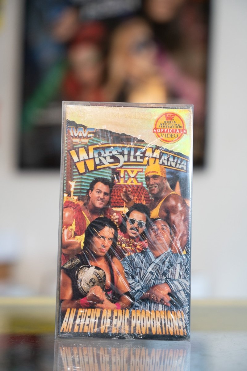 WWF WrestleMania IX VHS sealed in shrink wrap with Bret Hart Hulk Hogan and Randy Savage at Caesars Palace with gold title text
