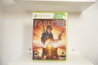 Xbox 360 Fable III case hero sword pistol golden throne fiery sky FABLE III serif text Lionhead Studios Microsoft Mature