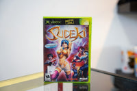 Xbox Sudeki game case 2004 Climax Studios four fantasy characters golden armor blue hair purple background gold title text Only on Xbox